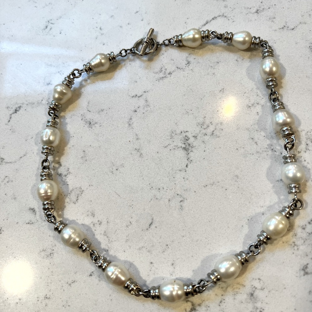 Solid sterling silver and pearl necklace.